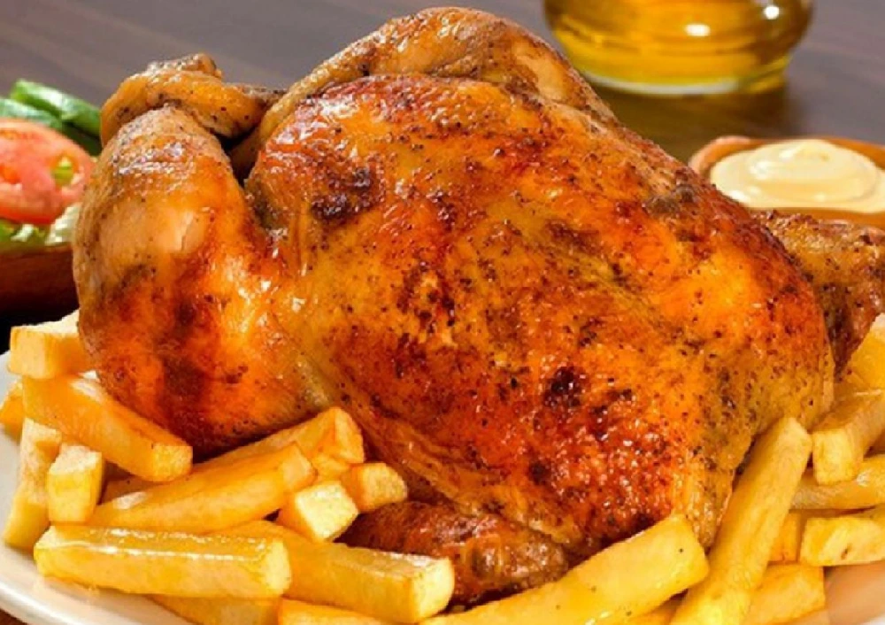 origen del pollo a la brasa tradicional